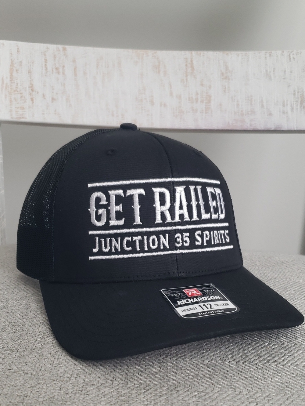 Richardson 112 Black Trucker Hat